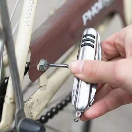 EE65 SCYZORYK WIELOFUNKCYJNY SIRVIVAL TURYSTYCZNY OTWIERACZ ŚRUBOKRĘT NOŻYCZKI