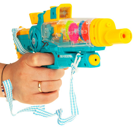 TG71056 PISTOLET PRZEZROCZYSTY WIBRACYJNY EFEKTY ŚWIETLNE GEAR TRYBIKI ZĘBATKI LED